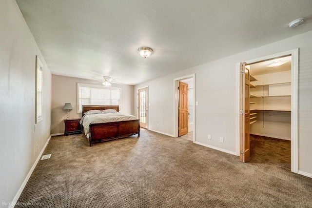 4023 W Hoffman Ave, Spokane, WA 99205 - bedroom with a spacious closet, carpet flooring, and visible vents