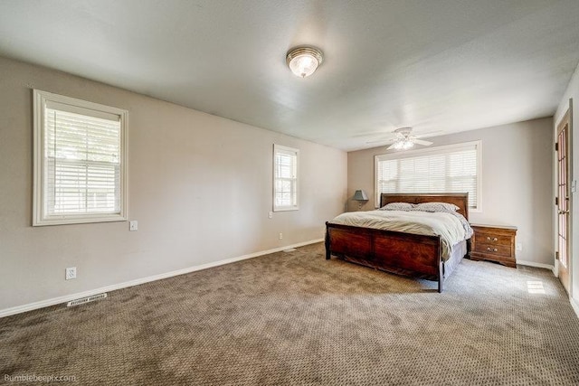 4023 W Hoffman Ave, Spokane, WA 99205 - bedroom with a ceiling fan, carpet floors, baseboards, and visible vents