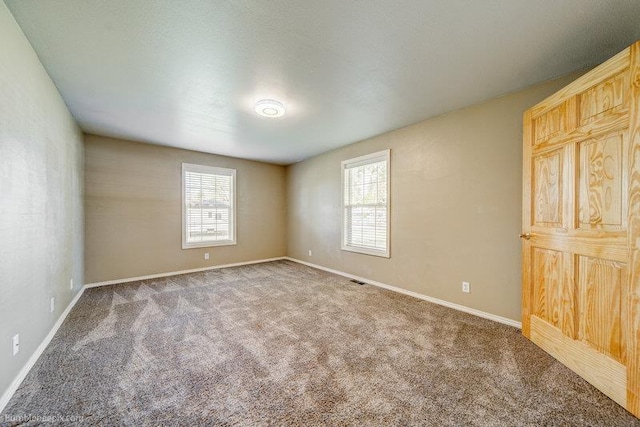 4023 W Hoffman Ave, Spokane, WA 99205 - unfurnished room with carpet floors and baseboards