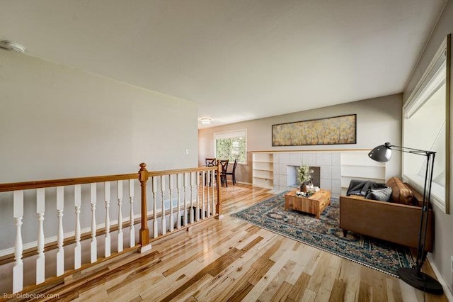 4023 W Hoffman Ave, Spokane, WA 99205 - sitting room featuring wood finished floors, an upstairs landing, and baseboards