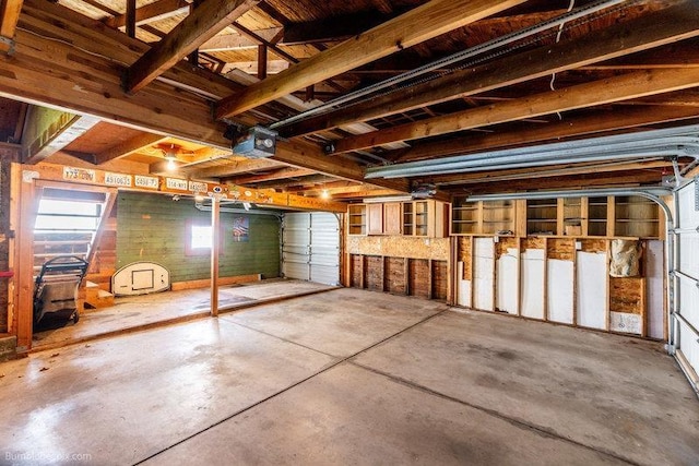 4023 W Hoffman Ave, Spokane, WA 99205 - garage featuring a garage door opener