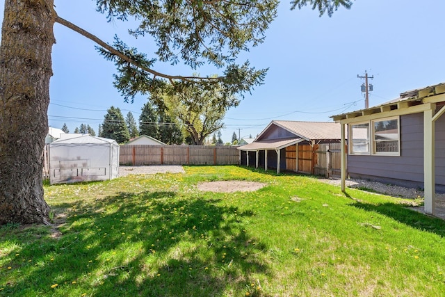 view of yard with a fenced backyard
