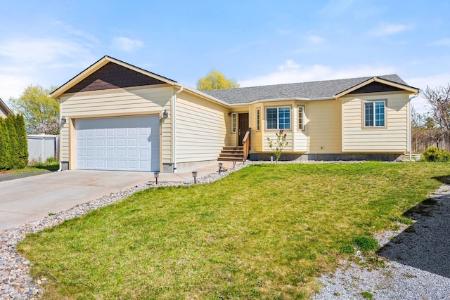 single story home with concrete driveway, an attached garage, and a front lawn