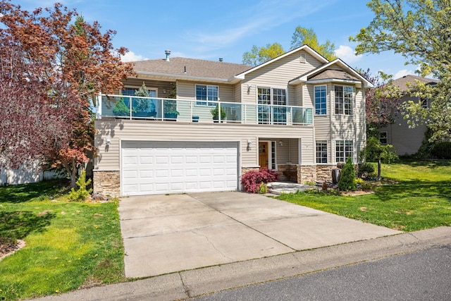 traditional-style home featuring a front yard, stone siding, and a balcony