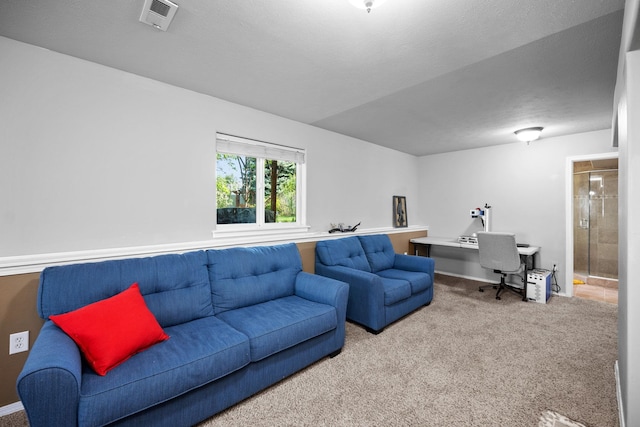 living room featuring visible vents and carpet floors