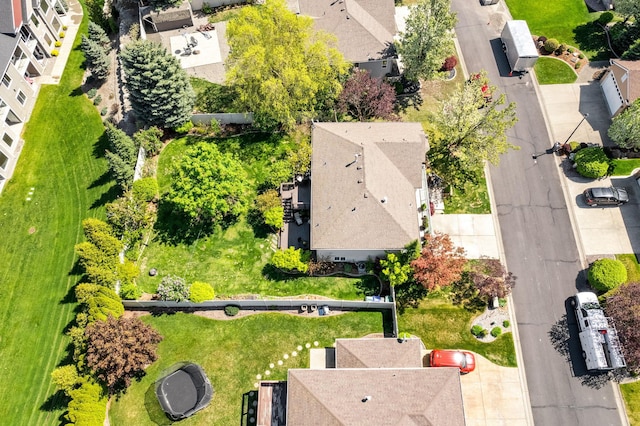 birds eye view of property with a residential view