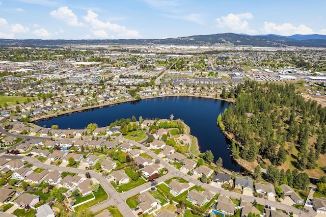 aerial view with a residential view and a water and mountain view