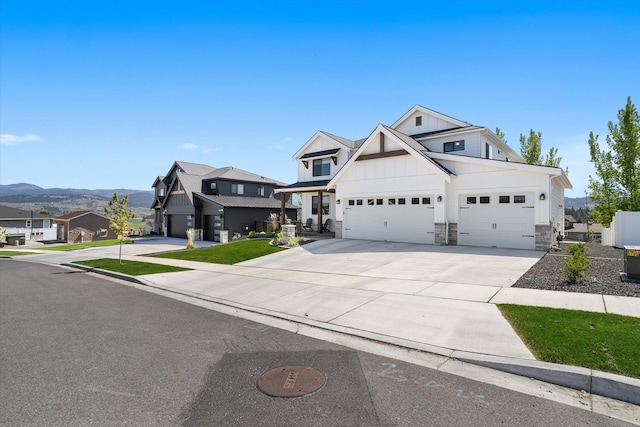 view of front facade with board and batten siding, driveway, a garage, a residential view, and stone siding
