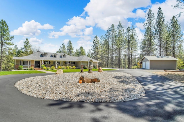 21724 N Perry Rd, Colbert, WA 99005 - farmhouse with curved driveway, a detached garage, and an outbuilding