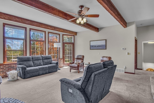 21724 N Perry Rd, Colbert, WA 99005 - carpeted living room with baseboards, a ceiling fan, visible vents, and beam ceiling
