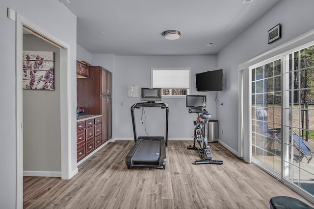 21724 N Perry Rd, Colbert, WA 99005 - workout room featuring light wood-style flooring and baseboards