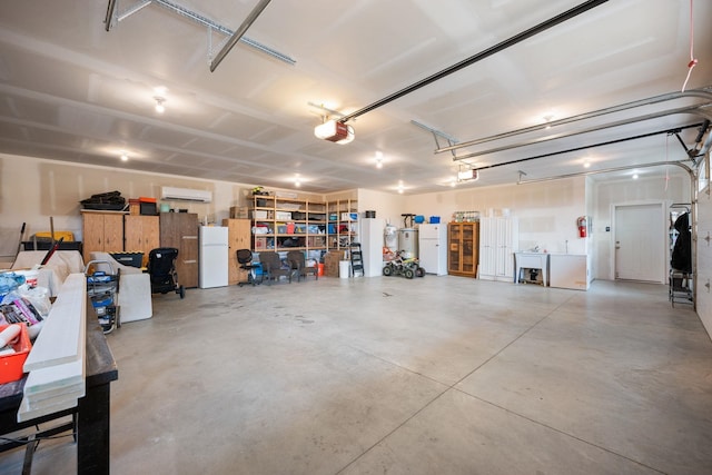 16717 E Washington Rd, Valleyford, WA 99036 - garage with freestanding refrigerator, a garage door opener, and an AC wall unit