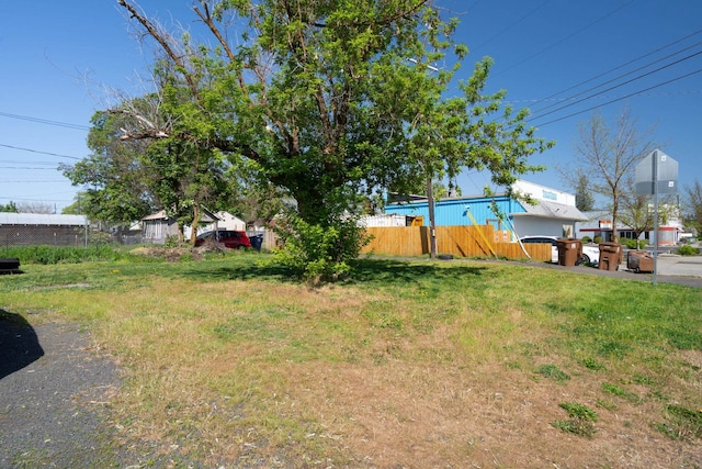 view of yard with fence