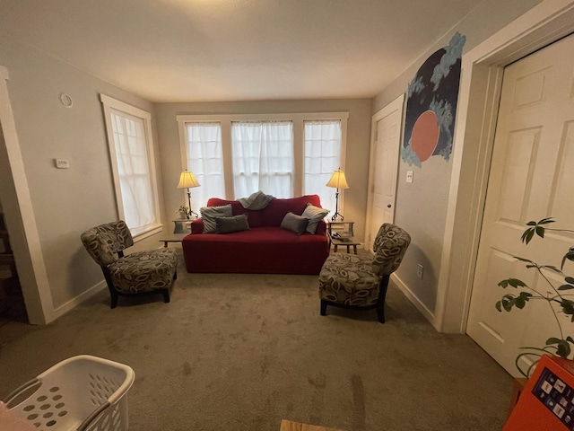 living room with carpet flooring and baseboards