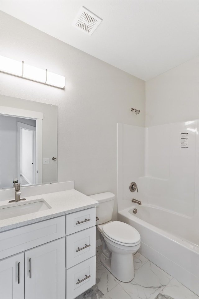 2623 S Vera Crest Dr, Spokane Valley, WA 99037 - full bathroom with toilet, marble finish floor, vanity, visible vents, and tub / shower combination