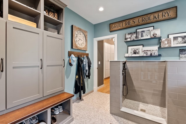 mudroom with baseboards and recessed lighting