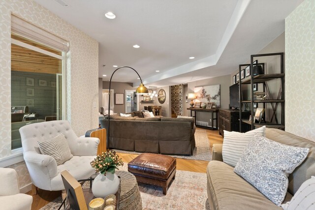 living room featuring recessed lighting, light wood-style floors, and wallpapered walls