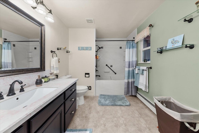 406 N Northridge Way, Fairfield, WA 99012 - bathroom with a baseboard radiator, toilet, visible vents, shower / bath combination with curtain, and vanity