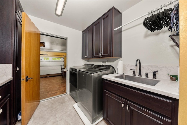 406 N Northridge Way, Fairfield, WA 99012 - laundry room featuring a sink, cabinet space, and washer and clothes dryer