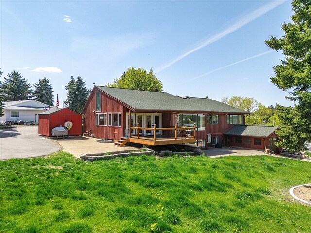 406 N Northridge Way, Fairfield, WA 99012 - back of house featuring a yard, a deck, and an outdoor structure