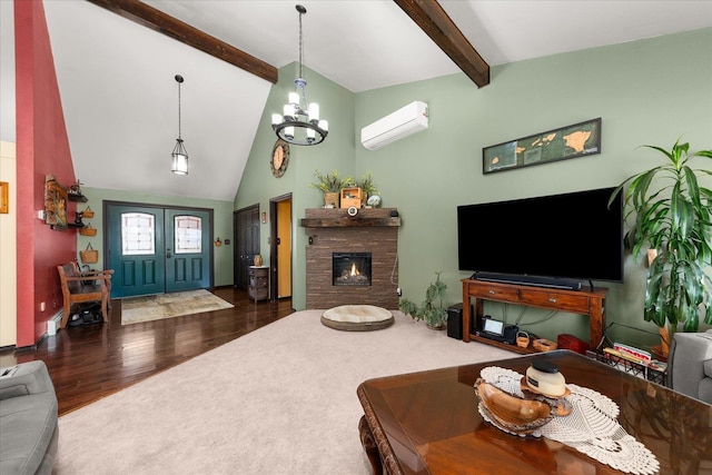 406 N Northridge Way, Fairfield, WA 99012 - living area featuring wood finished floors, an AC wall unit, beamed ceiling, a notable chandelier, and a stone fireplace