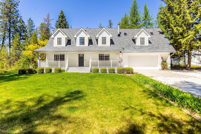 2712 W Eden Ln, Deer Park, WA 99006 - cape cod house with covered porch, roof with shingles, driveway, a garage, and a front lawn