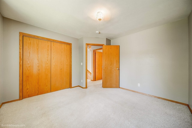 2712 W Eden Ln, Deer Park, WA 99006 - unfurnished bedroom with carpet flooring, a closet, and baseboards