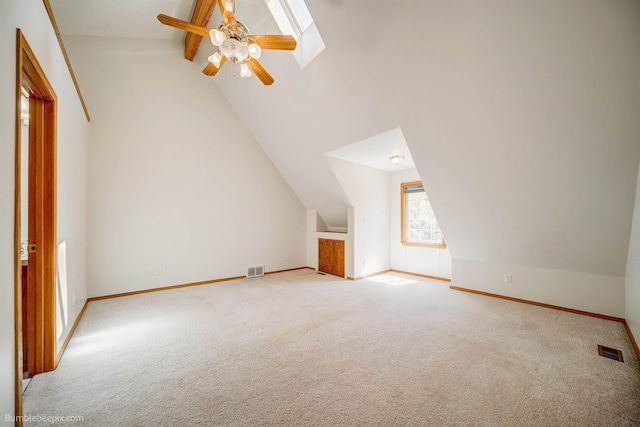 2712 W Eden Ln, Deer Park, WA 99006 - additional living space featuring light carpet, baseboards, visible vents, and vaulted ceiling with beams
