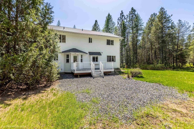 2712 W Eden Ln, Deer Park, WA 99006 - back of house featuring a yard and a deck