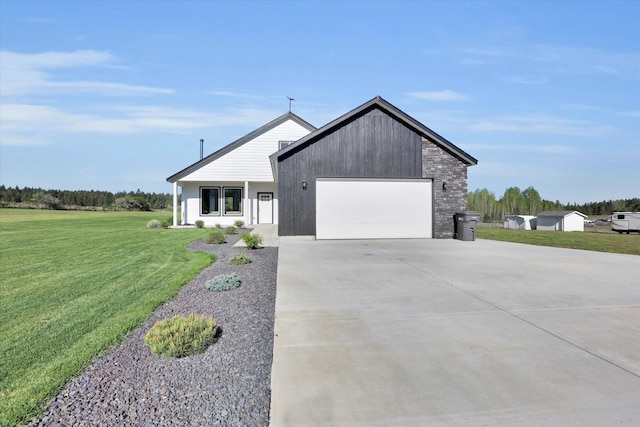 32715 N Elk Chattaroy Rd, Chattaroy, WA 99003 - modern inspired farmhouse with a front yard, driveway, and a garage