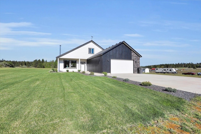 32715 N Elk Chattaroy Rd, Chattaroy, WA 99003 - view of front of property with a garage, driveway, and a front lawn