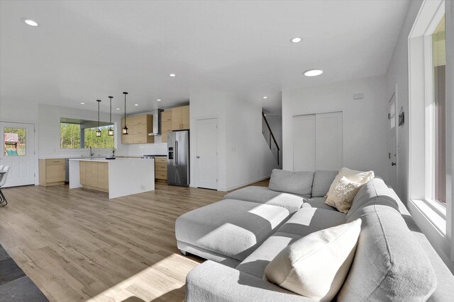 32715 N Elk Chattaroy Rd, Chattaroy, WA 99003 - living area featuring recessed lighting, light wood-style flooring, and stairs