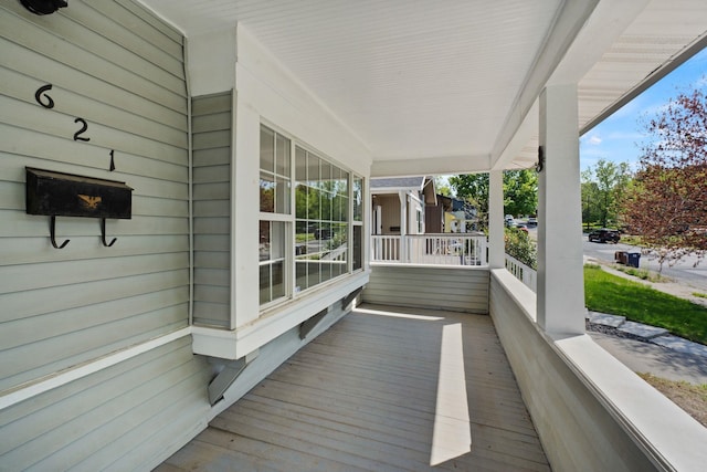 deck with covered porch