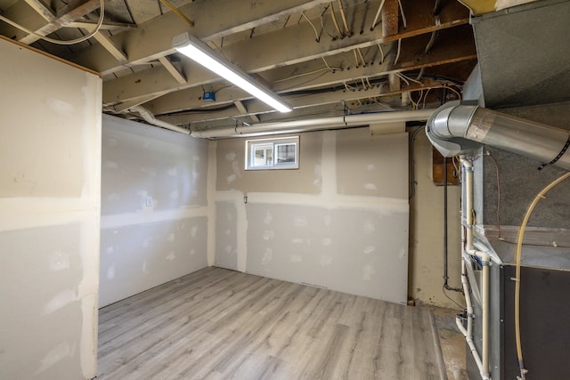 basement with wood finished floors