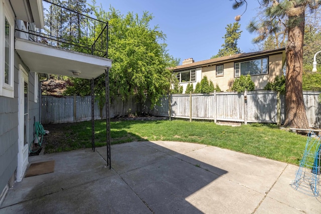 view of patio with a fenced backyard