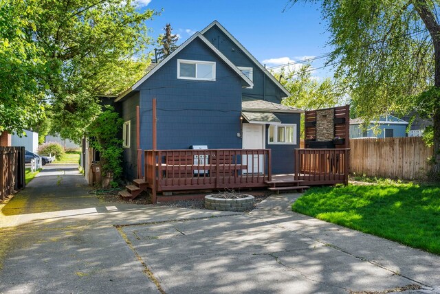 1815 E Longfellow Avenue 1817E. Longfellow Ave, Spokane, WA 99207 - rear view of house featuring a patio area, a deck, and fence
