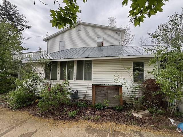 view of front of house featuring metal roof