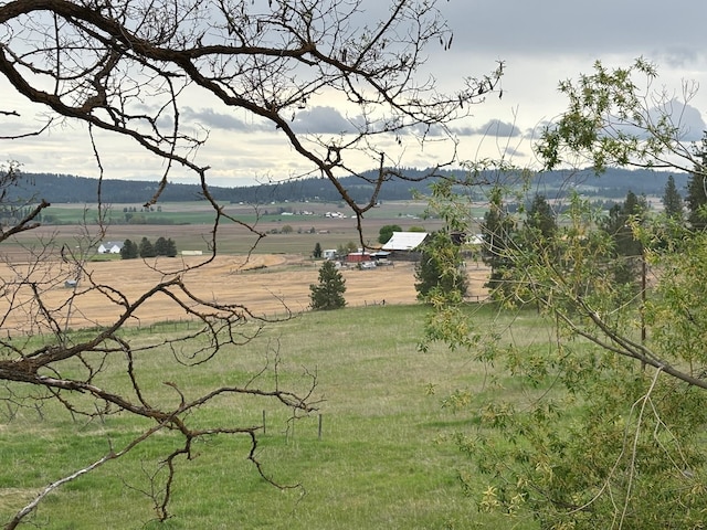 exterior space with a rural view