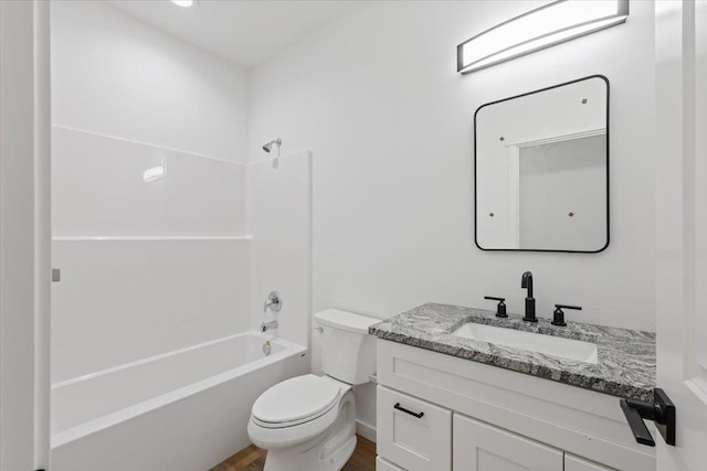 full bath with vanity, toilet, bathtub / shower combination, and wood finished floors