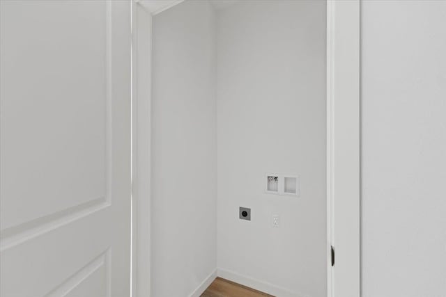 washroom featuring wood finished floors, electric dryer hookup, laundry area, washer hookup, and baseboards