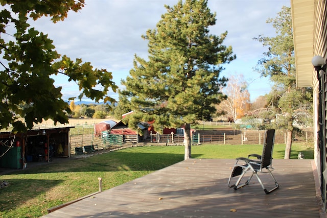deck with fence and a lawn