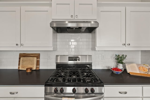 5718 N Vista Park Dr, Spokane, WA 99217 - kitchen featuring stainless steel range with gas cooktop, ventilation hood, dark countertops, white cabinetry, and tasteful backsplash