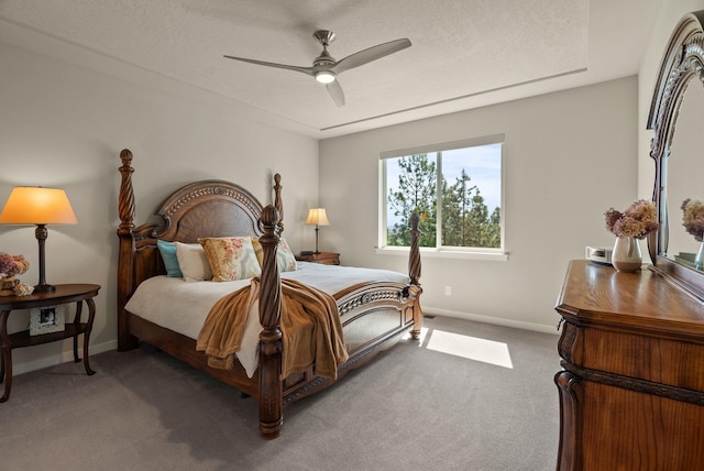 bedroom featuring carpet floors, baseboards, and a ceiling fan
