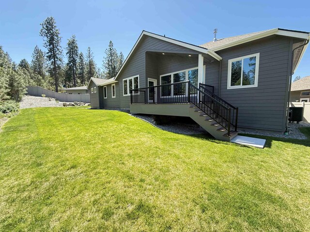 1715 S Lloyd Ln, Spokane, WA 99212 - back of property with a deck, central AC unit, and stairs