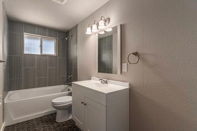 full bath with toilet, tile patterned flooring, vanity, shower / bathing tub combination, and a textured wall