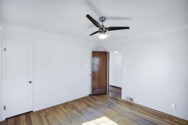2424 W Fairview Ave, Spokane, WA 99205 - empty room featuring a ceiling fan and wood finished floors