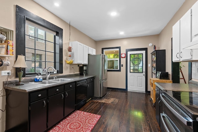 901 W 15th Ave, Spokane, WA 99203 - kitchen featuring appliances with stainless steel finishes, a sink, white cabinets, dark wood finished floors, and recessed lighting