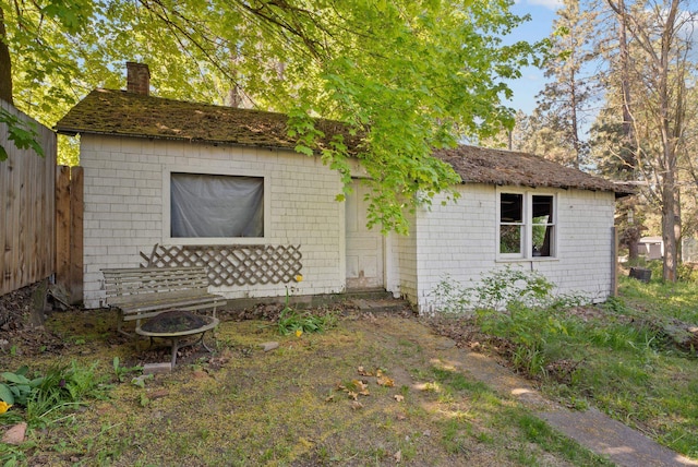 901 W 15th Ave, Spokane, WA 99203 - view of front facade with a chimney and fence