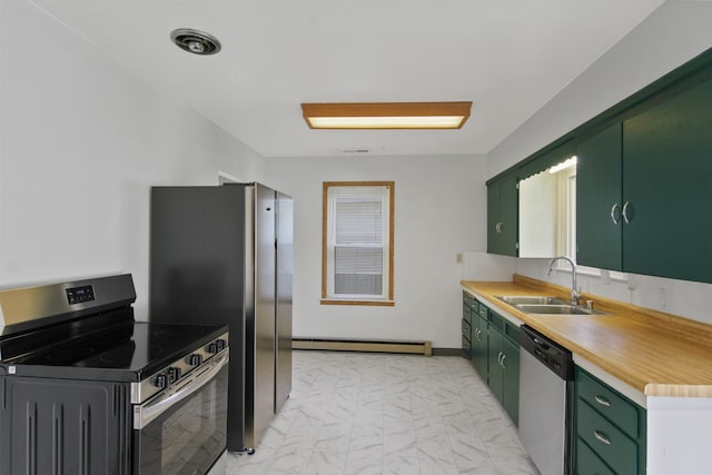 314 W Buckeye Ave, Spokane, WA 99205 - kitchen featuring green cabinetry, stainless steel appliances, a sink, and baseboard heating