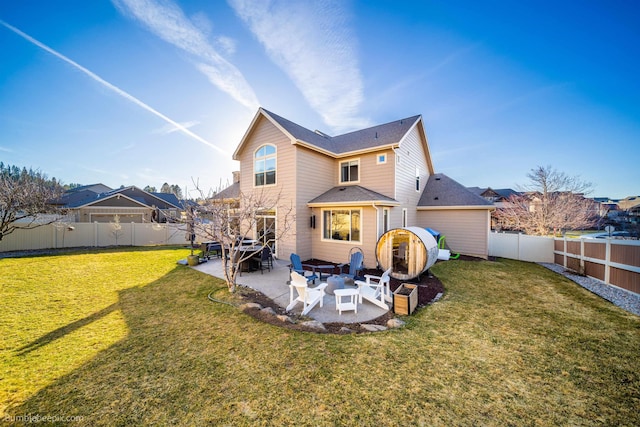 back of property with a patio